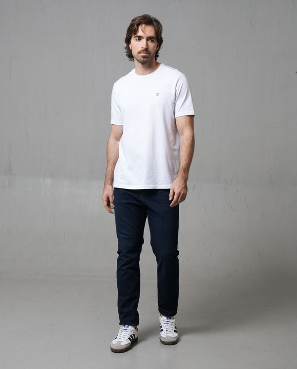 Jean Slim tono oscuro para hombre