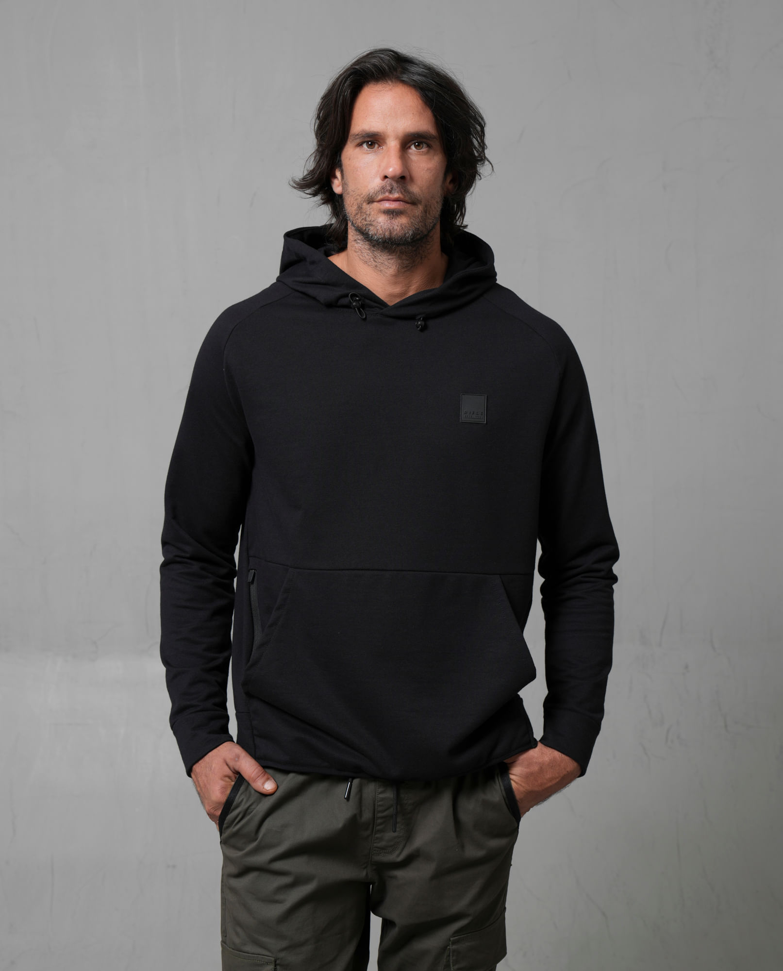 Buzo con bolsillos en frente para hombre