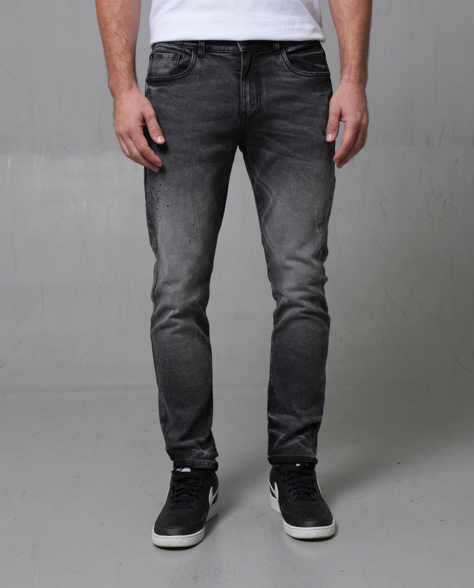 Jean Slim cinco bolsillos con raspones localizados para hombre