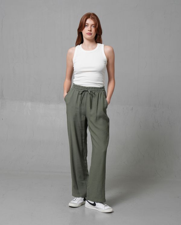 Pantalón con cintura elástica y abertura en bota para mujer