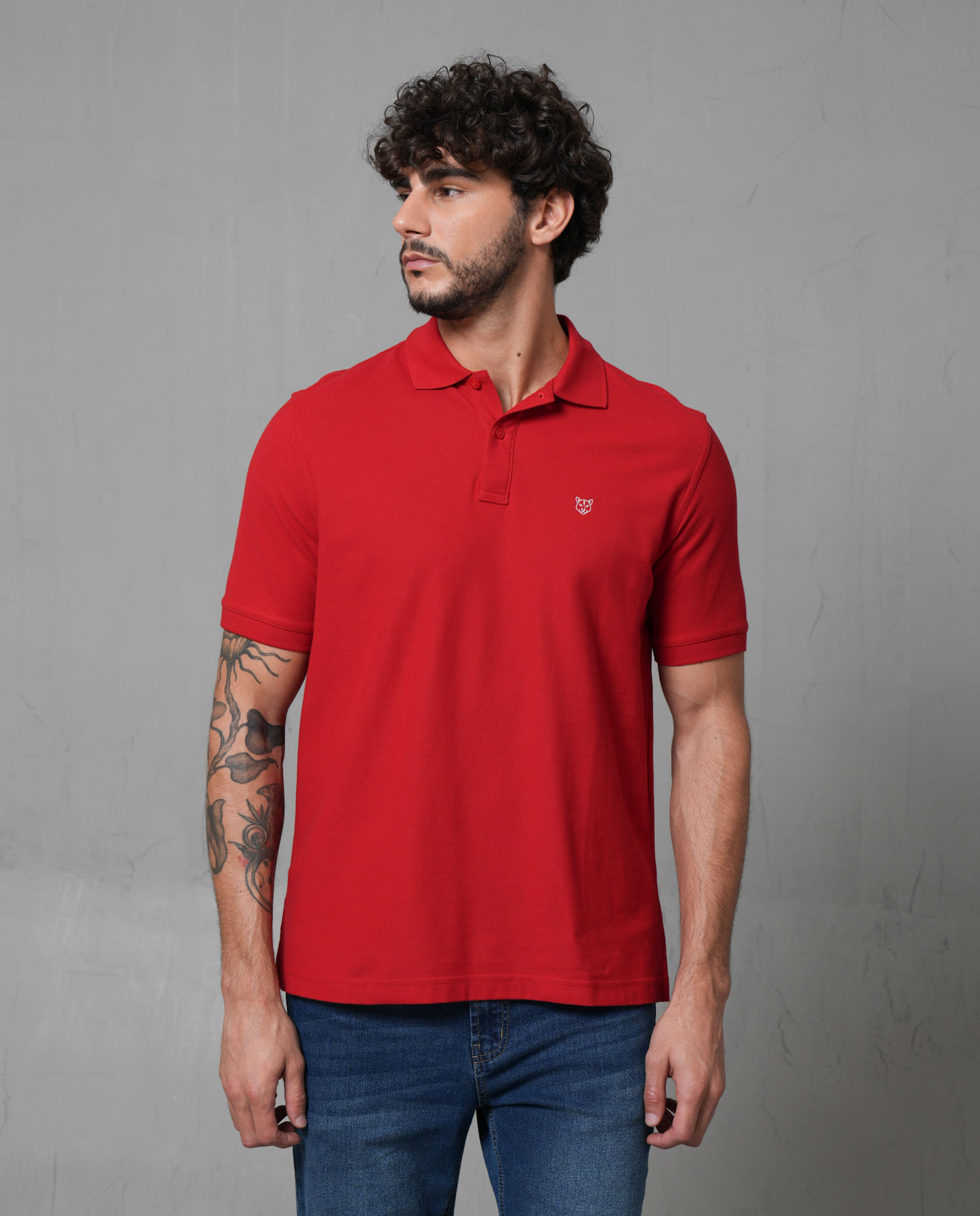 Polo con aplique de puma en punto corazón para hombre