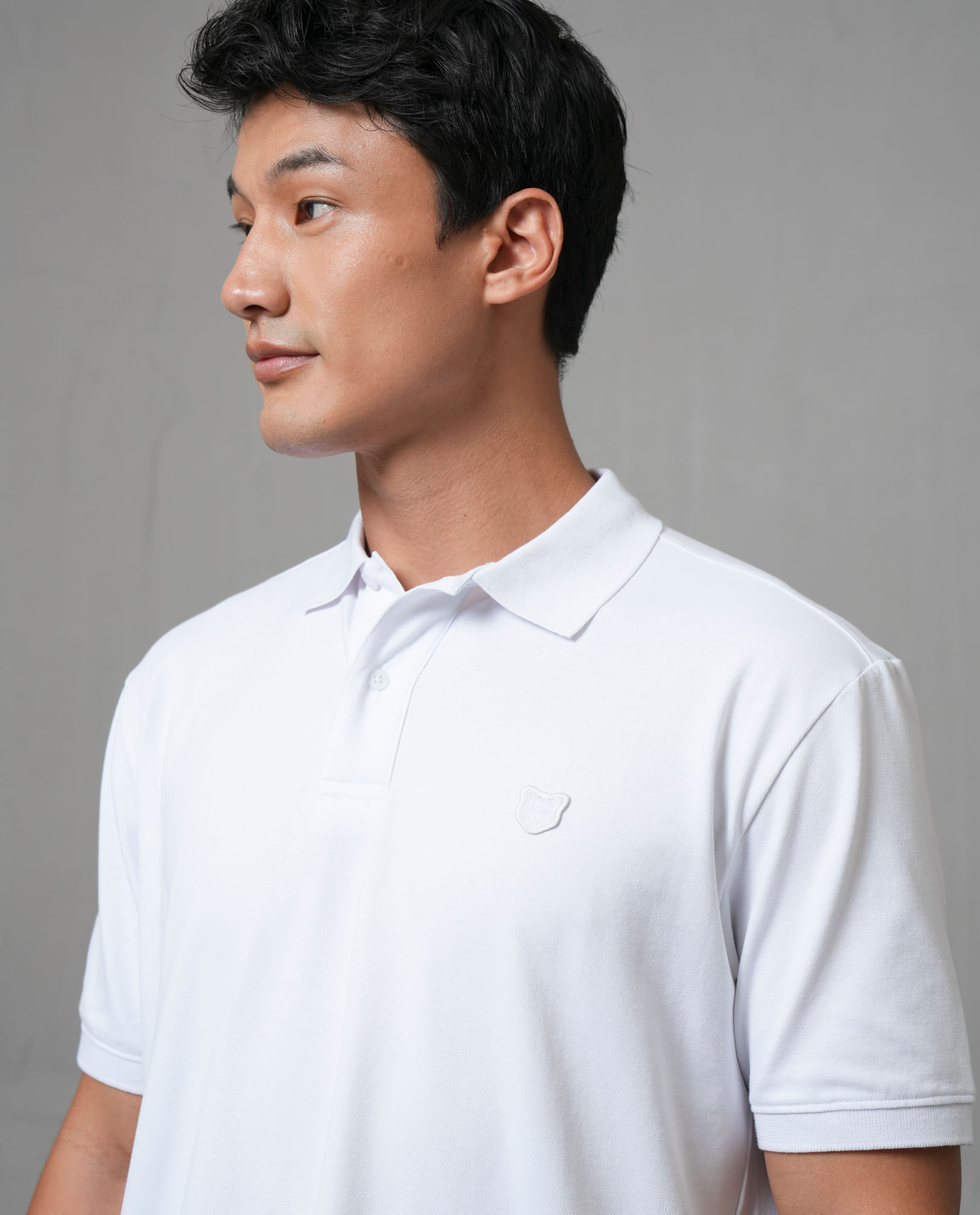 Polo con aplique de puma en punto corazón para hombre