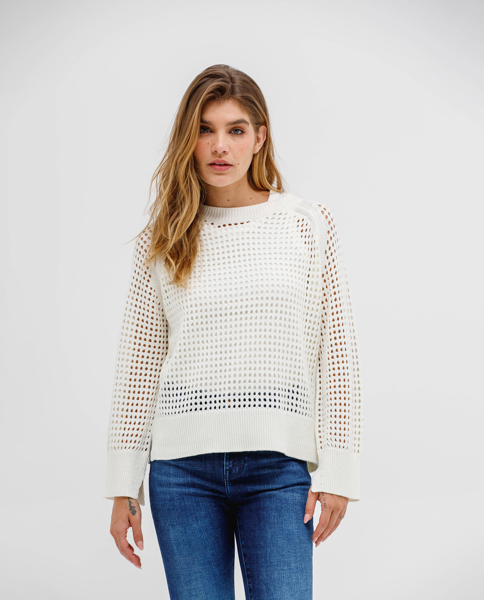 Buzo con detalles desagujados para mujer