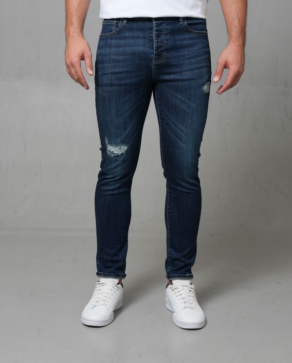 Jean Super Slim con rotos para hombre